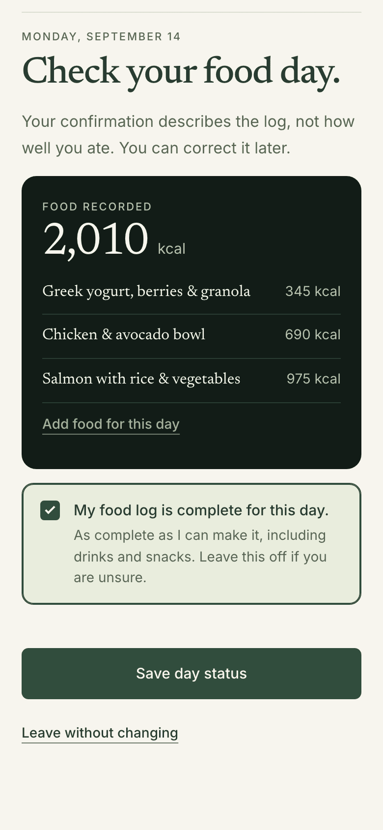 Monday's day check in the sample: 'Check your food day.', three meals totaling 2,010 kcal, 'My food log is complete for this day.' ticked, and a Save day status button.